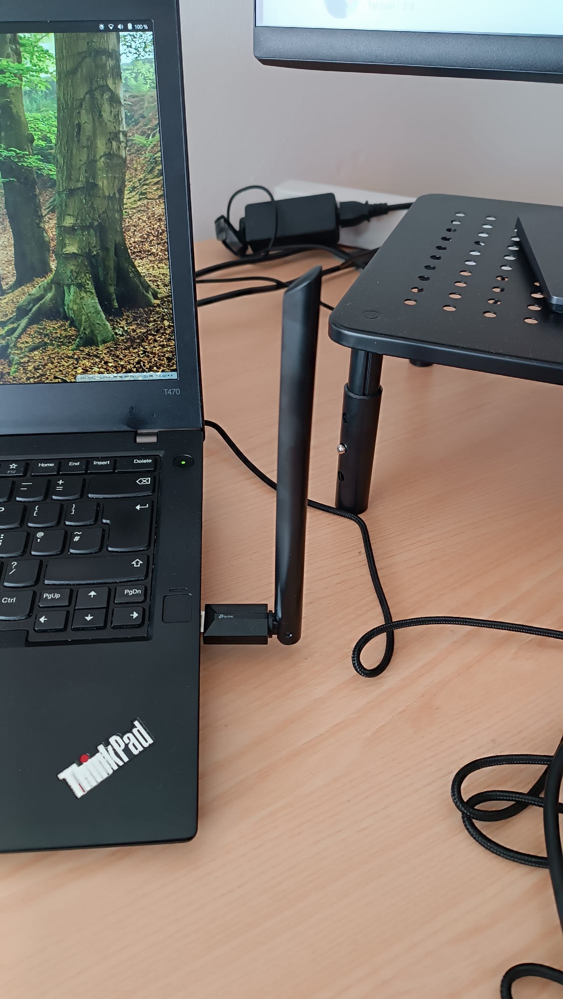 The TP-Link dongle plugged into the ThinkPad T470's USB port